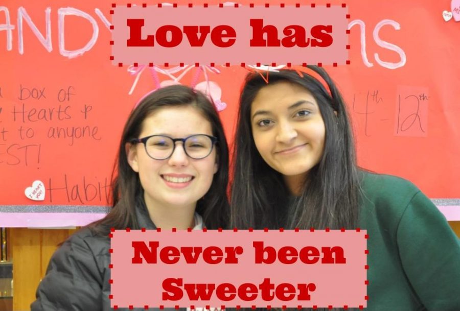 President Sydney Shofner and Hira Mien selling candygrams. The club has begun selling the candy as a way to raise money for their projects.