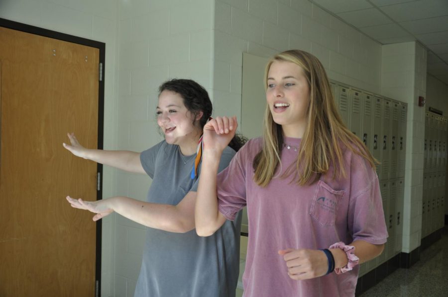 Parker Ramey (left) and Clara LaRue (right) attempt to make their TikTok go viral. Tiktok has become a worldwide phenomen, but what really made it tick?