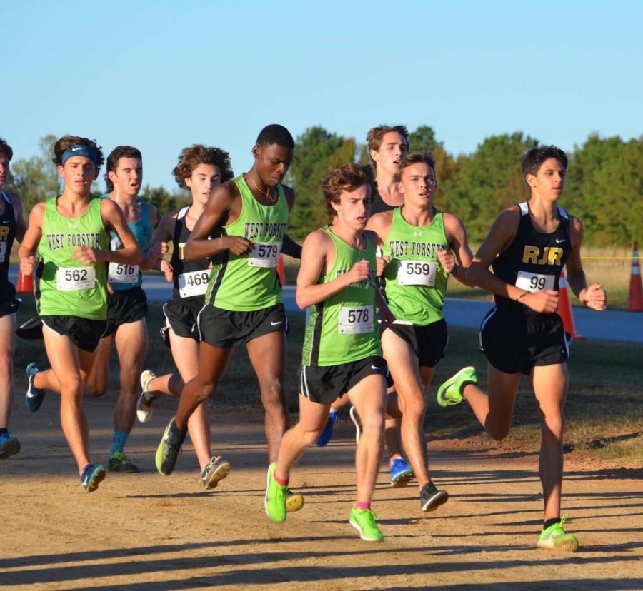 Cross country runners competing in a race last year. After graduating seniors Drew Okon and Will Atkins, the team looks to Jeremy Eldredge and Jackson Nichols to lead them.