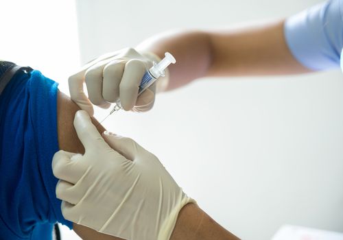 A man getting a vaccine.