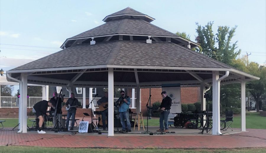 None of the Above performs in Shallowford Square. Their music is a distinct blend of bluegrass with each band member's personal style.