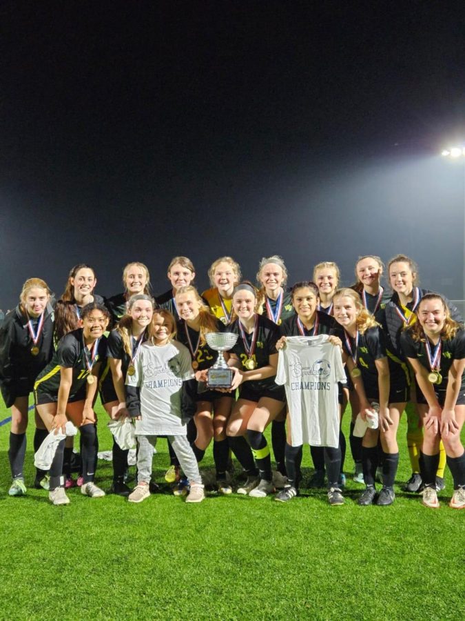 Girls soccer celebrating their 2022 conference championship 