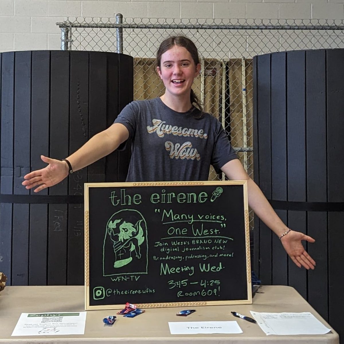 Claire Reinthaler, founder of the Eirene, shows off her display for the Club Fair