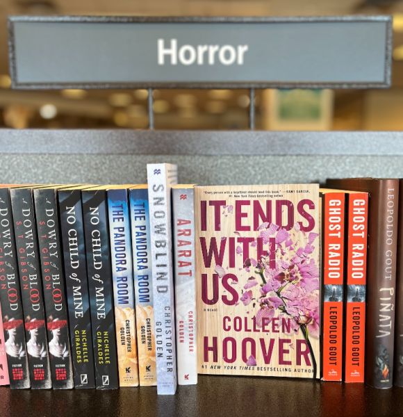 Colleen Hoovers novel placed in the horror section of a bookstore. 
