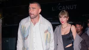 Taylor Swift and Travis Kelce after a Chiefs game. 