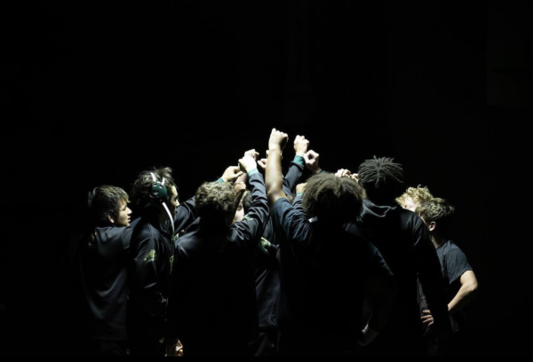 Boys wrestling team huddle before a match.
(Photo courtesy of West Forsyth Sports Marketing)