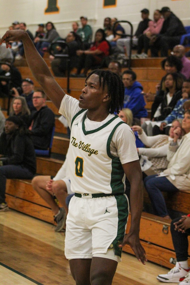 Junior Jacari Brim in a state playoff basketball game against Mooresville, a potential Titan conference opponent under the new classification system. (Photo courtesy of West Forsyth Sports Marketing)