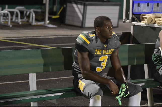Chaplin taking a rest on the bench during the Homecoming game against Glenn this past season.