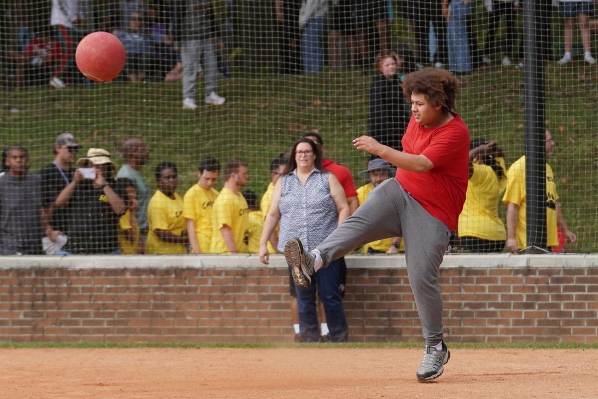 OCS student playing kickball.