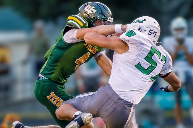 Cruise making a blocking at Weddington game.