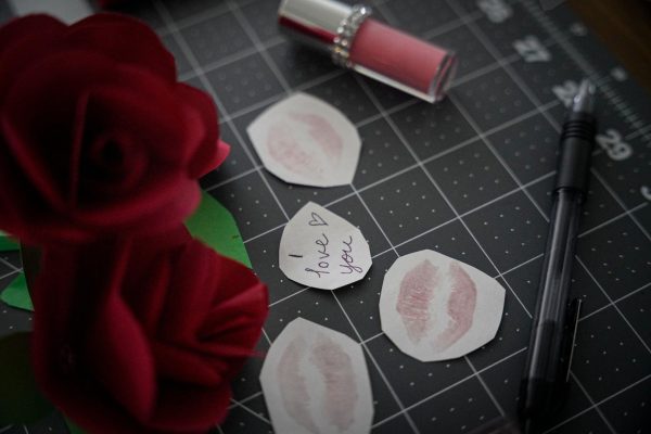 Handmade paper flowers and love notes.