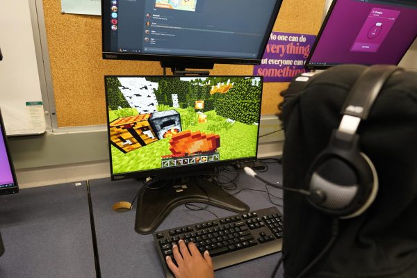 Student plays video games in school.