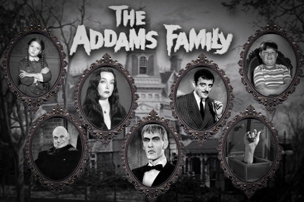 Framed pictures of different characters from The Addams Family.