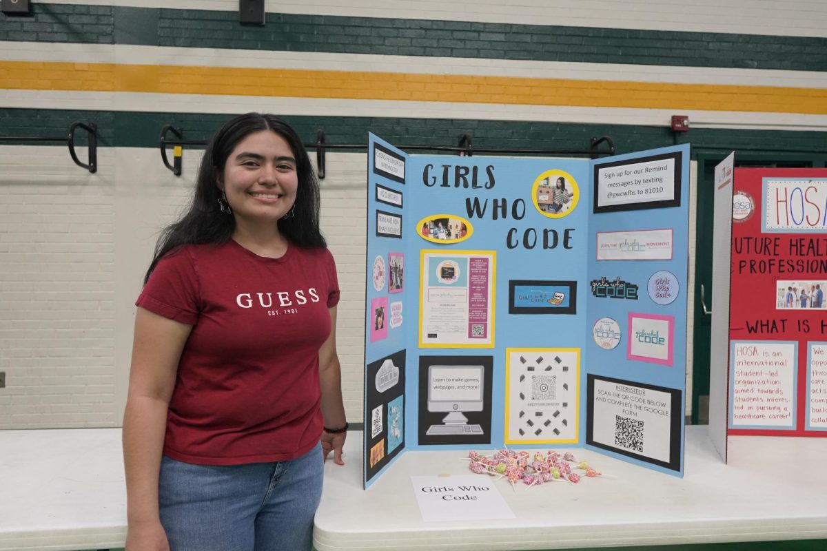 Jennifer Romero reps the girls who code club at the club fair.