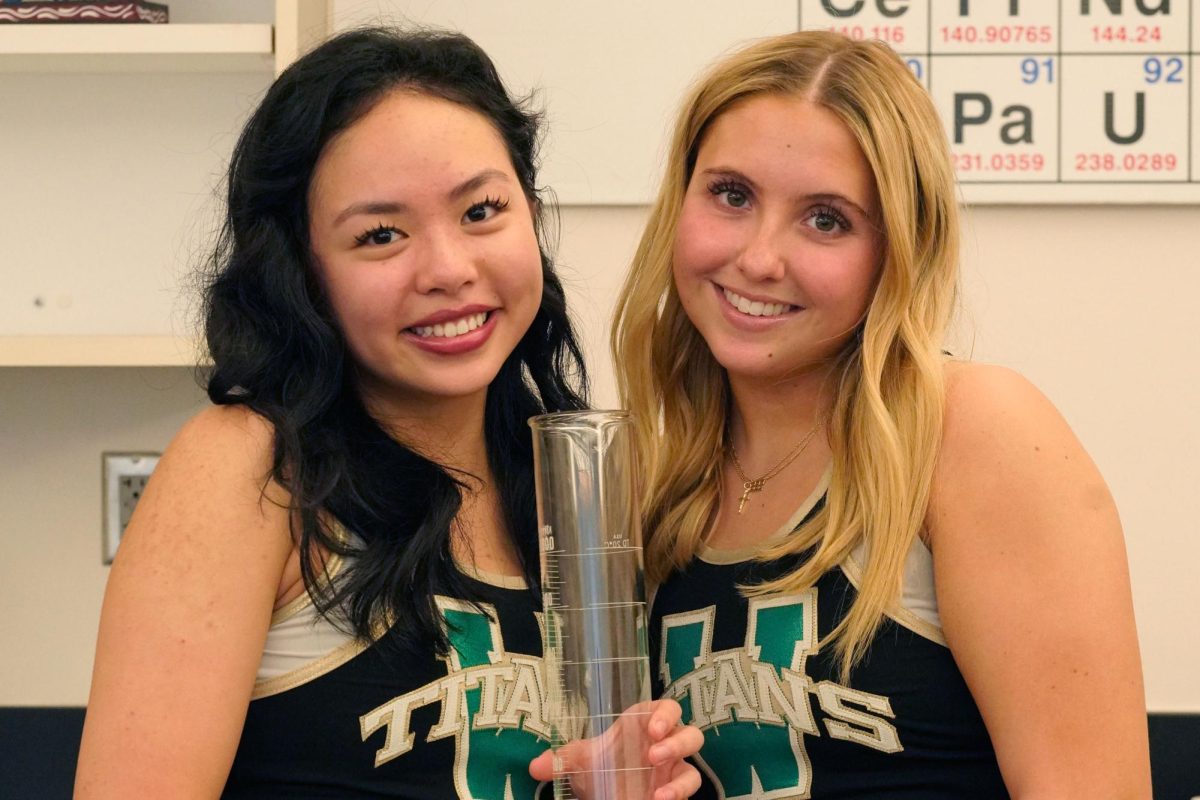 Maggie Guo and Ally Knotts of the Biochem Club 