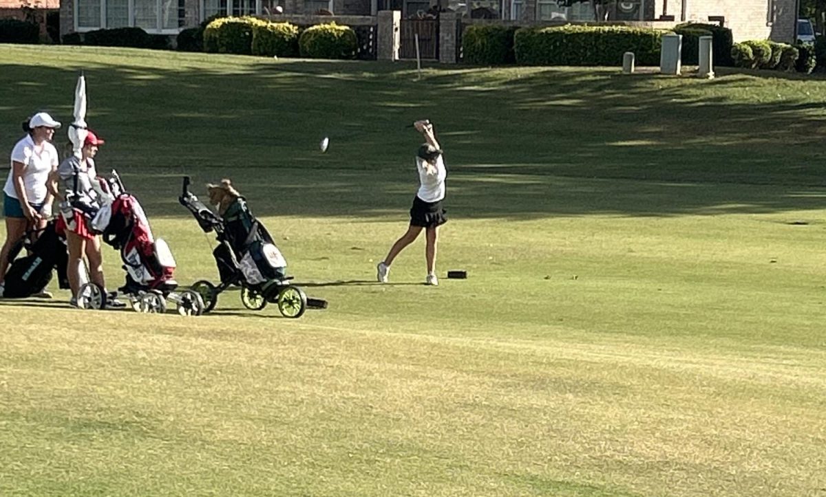 Sophia Perdue drives a tee shot during a recent golf match.