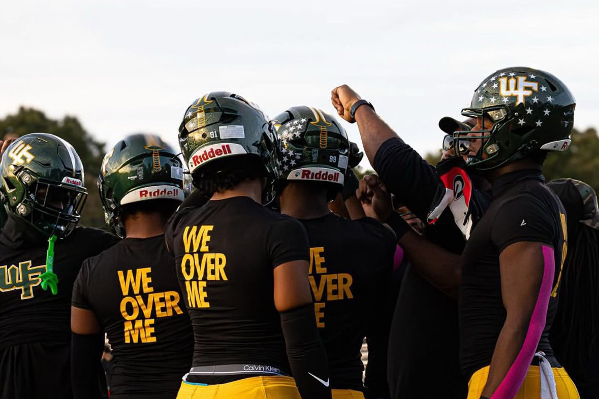 West Forsyth Titans huddle before game